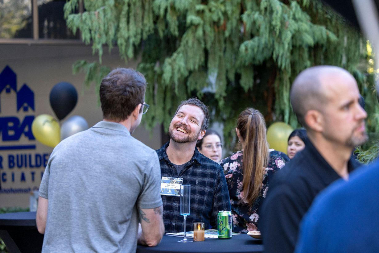 Members connecting at a Signature Networking reception